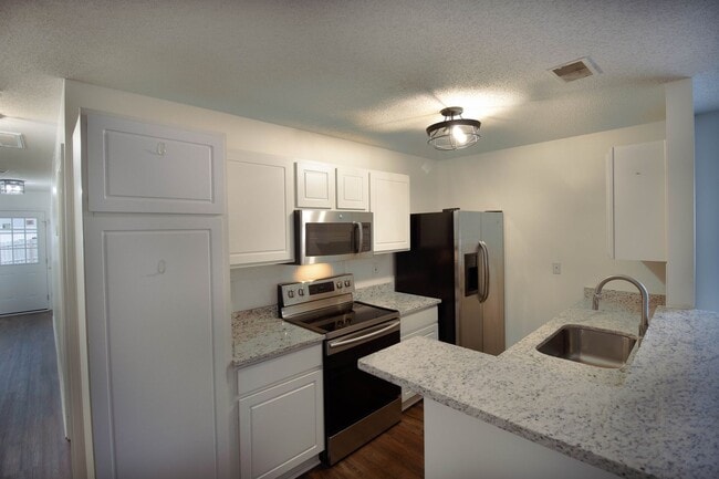 Photo - Recently Updated, and a FENCED Backyard!