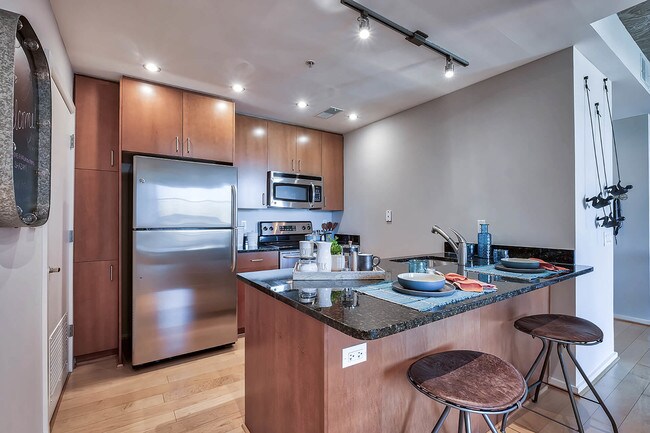 Standard built-in pantries and extended countertops are ideal for home chefs - IO Piazza by Windsor Apartments