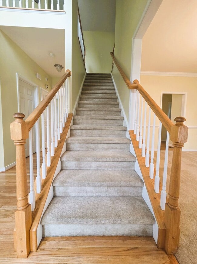 Photo - Stately brick front contemporary on huge c...