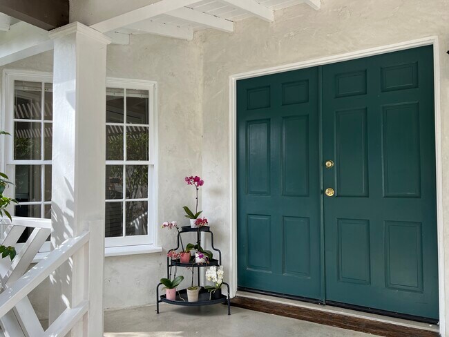 Front doors. Notice beautiful porch ceiling