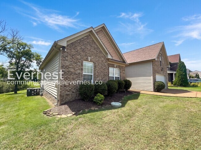 Photo - 3-Bed/2-Bath Home with Fireplace and 2-Car Garage/Available Now!