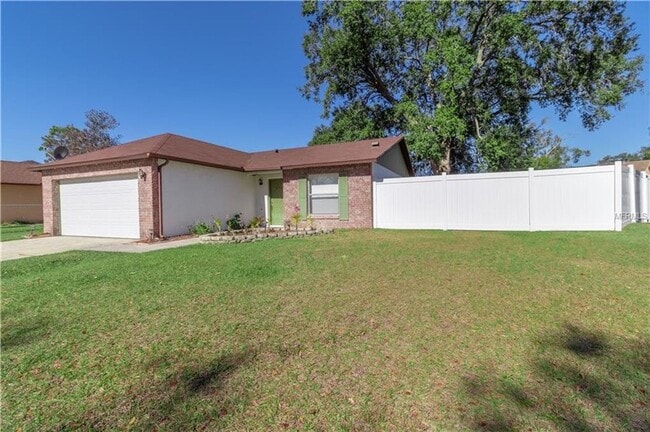 Photo - Freshly Painted 3/2 with Fenced Yard & Fireplace!