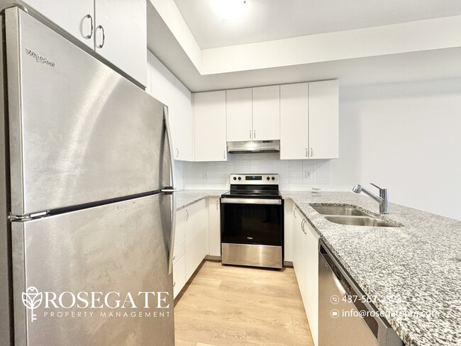 Photo - Massive 5-Bedroom + Den Townhouse with Garage & Deck in Oshawa