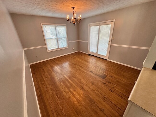 Photo - Nice 3 BR, 2 Bath Home! HW & Carpet Floors, Attached Garage, Fenced Backyard, Pets Ok!