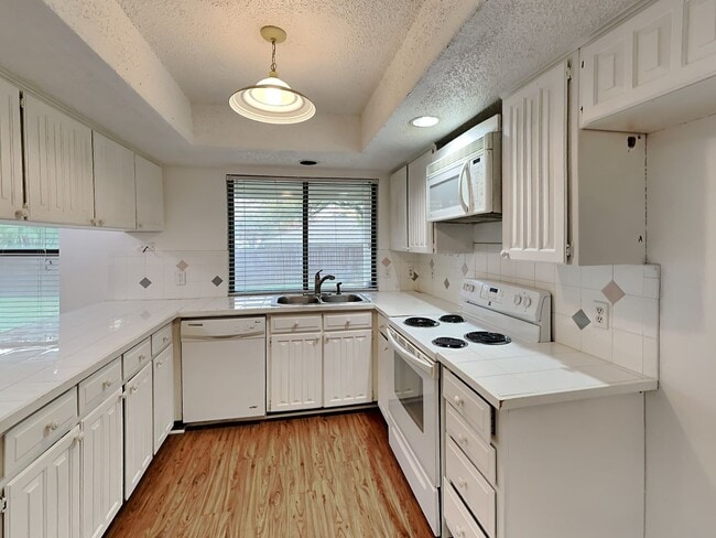 Photo - Bedford Beauty with Vaulted Ceilings, Entertainer’s Backyard & Designer Touches Throughout!