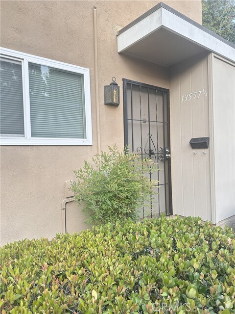Building Photo - 13557 Village Dr Unit 1/4 Rental