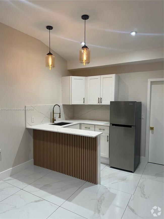 Building Photo - 1299 W 78th St Unit 0 Rental