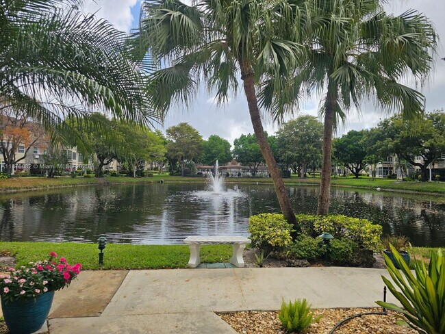 Building Photo - 3430 NW 52nd Ave Unit 104