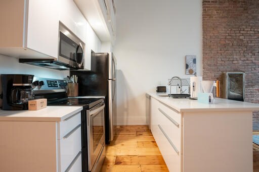 Photo - 306 E 51st St Unidad 4