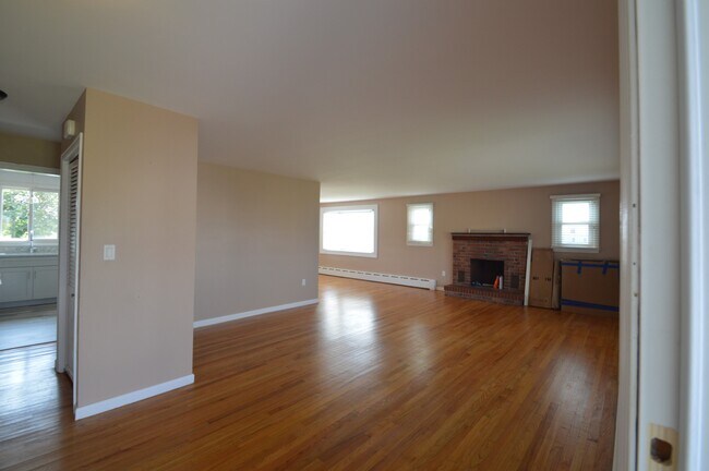 A spacious living area that opens to the dining area - 8 Chartier Cir