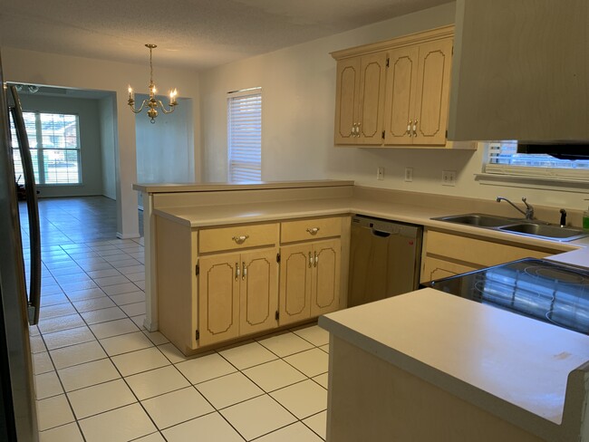 Kitchen with all stainless steel appliances - 4550 Barrington Ln