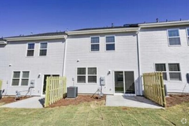 Building Photo - Spacious 3/2.5 Townhome Available February...