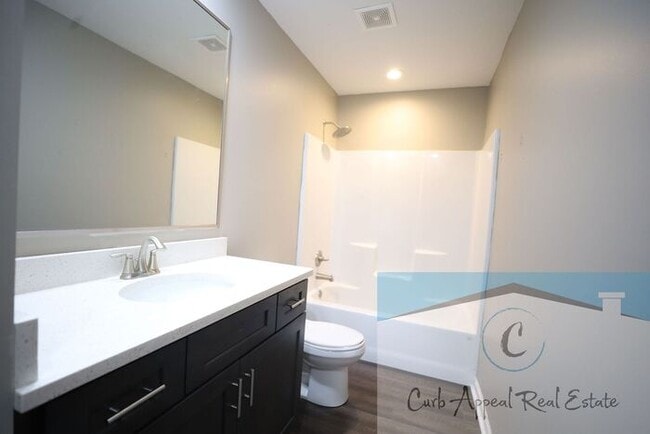 Photo - Move in special $800!! Luxury 2 bed, 1 bath duplex - new construction!! Washer, dryer, utilities ...