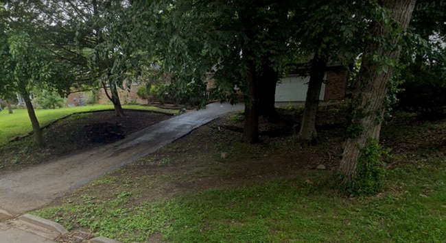 Photo - Spacious & Pet-Friendly 4BR Home in Prime ...