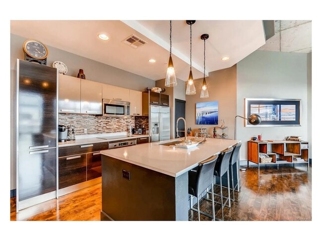 Luxurious penthouse that sits on the top floor overlooking Denver's skyline in the heart of LoHi