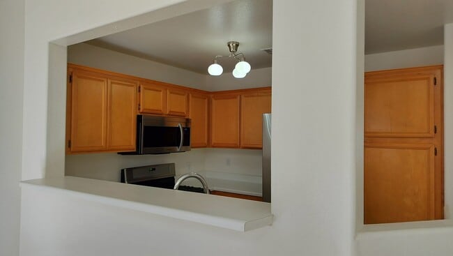 Photo - Townhome with Loft + Two Bedrooms/Baths - Designed for Comfort in Gated Community