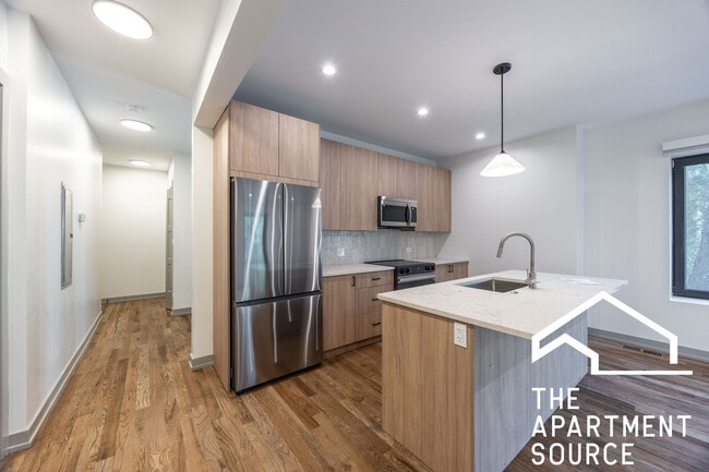 Building Photo - 1341 W Estes Ave Unit 1A Rental