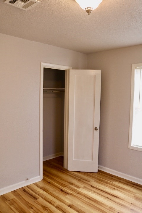 Bedroom with closet - 1439 N Olympia Ave