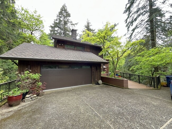 Photo - One-of-a-Kind Custom Home with Wall of Windows, Stone Fireplaces, Expansive Entertainment Space &...
