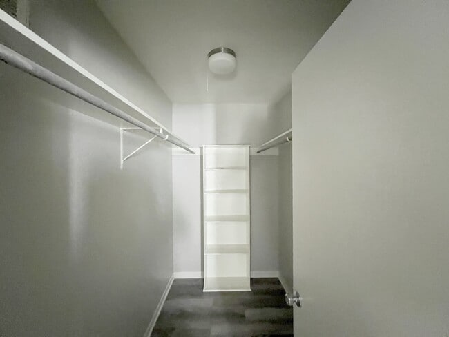 Store your belongings in style in this walk-in closet. - 2125 Banita St Unit 4