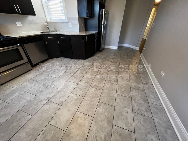 Photo - 6031 S Eberhart Ave Unit 2