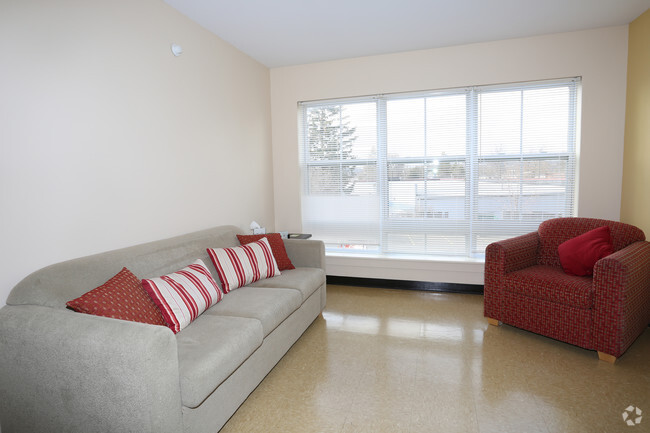 Living Room - College Suites at Cortland Apartments