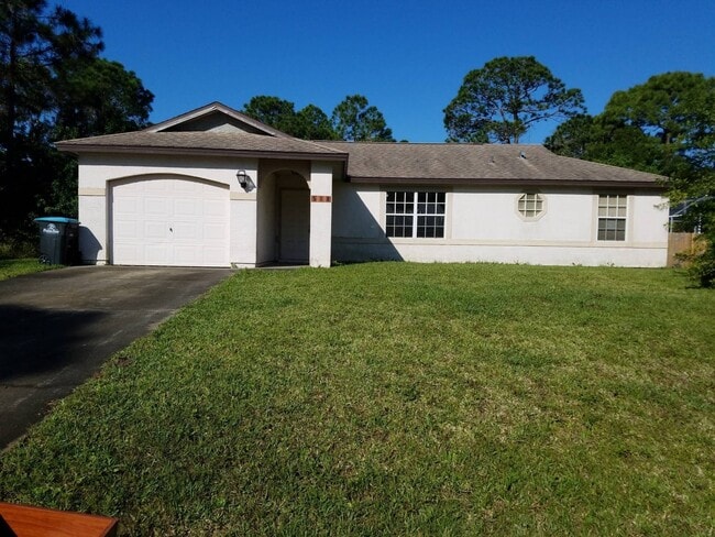 Building Photo - Nice 3 Bedroom 2 Bath home with Large Yard Close to Jupiter Elementary