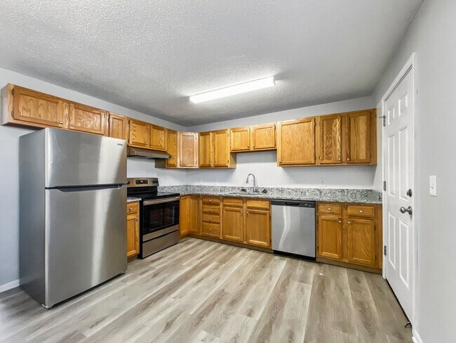 Photo - Updated 3-Bedroom Home with Garage & Deck in Kansas City, KS