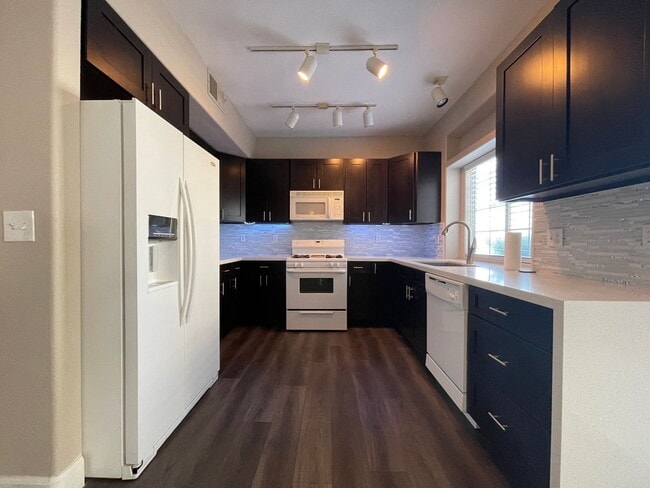 Photo - Beautifully remodeled first floor condo with attached 2 car garage!