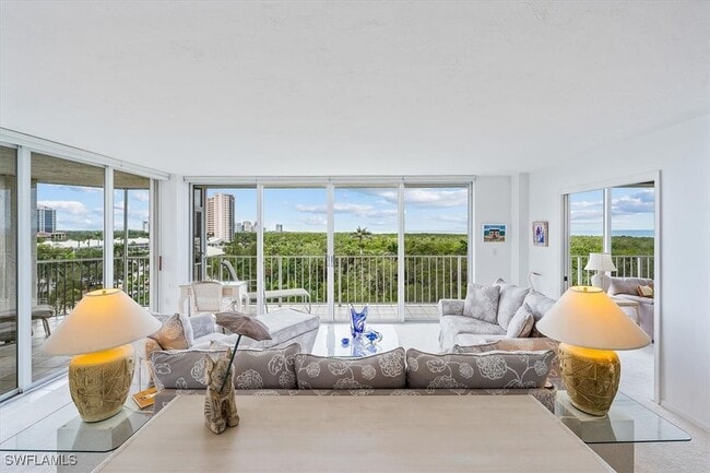 Building Photo - 6361 Pelican Bay Blvd Unit 501 Rental