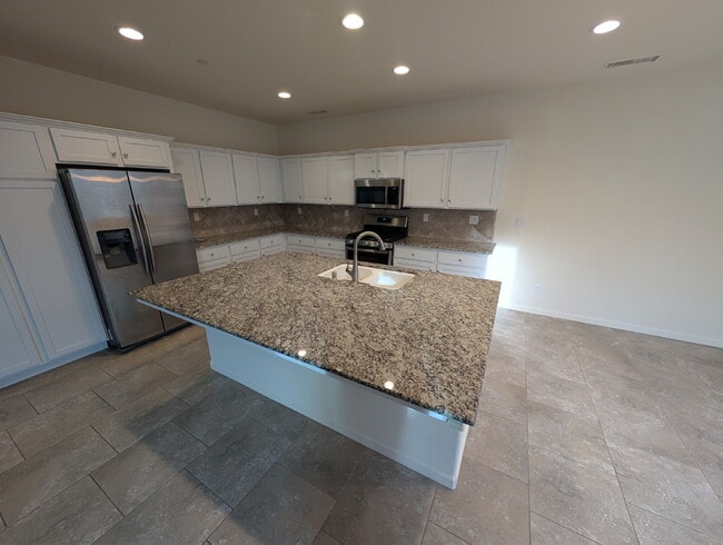 Photo - "Spacious 4-Bed Home with 2.5 Baths in Charming Clovis Locale – 1945 Sq. Ft. of Comfort!"