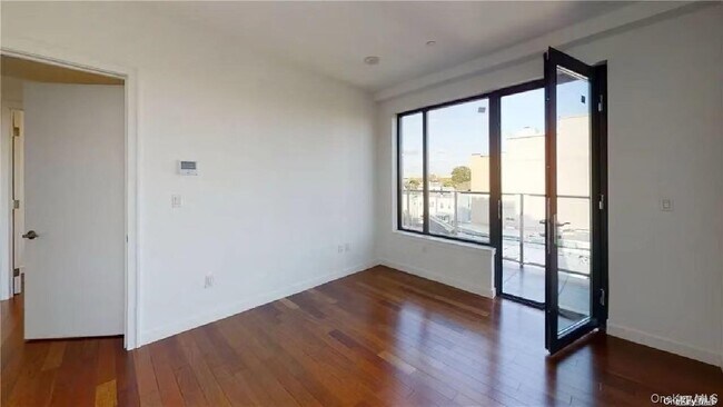 Photo - 32-60-60 106th St