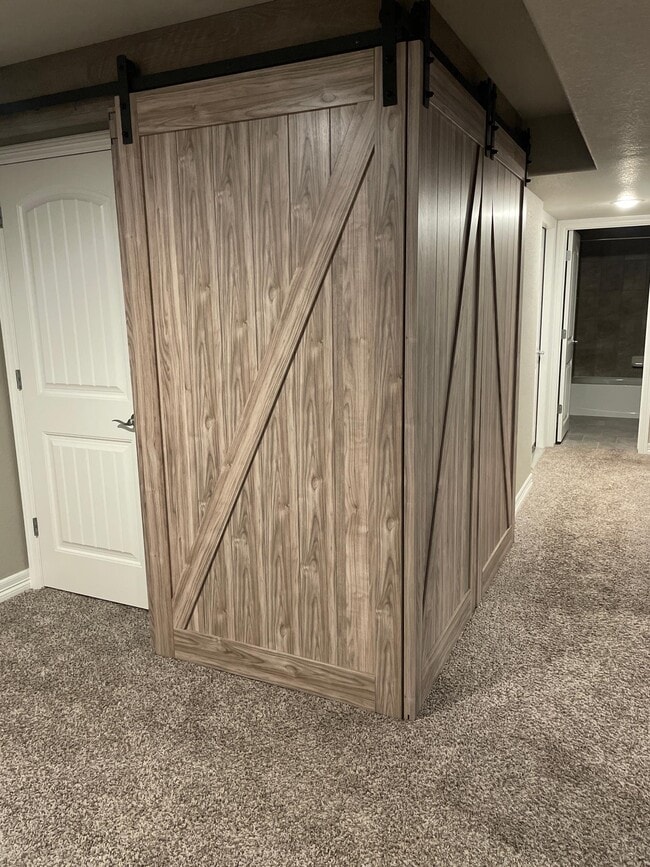 Barn door separates levels - 5383 Homeward Dr