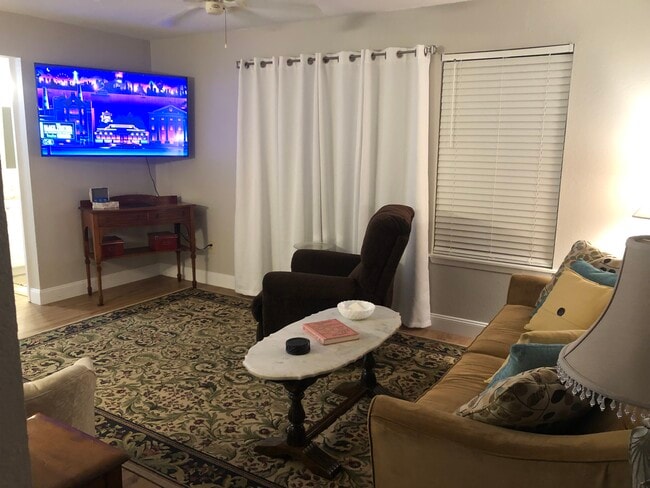 Living room 55 in TV - 3565 Sable Palm Ln Unit VILLAS AT LACITA