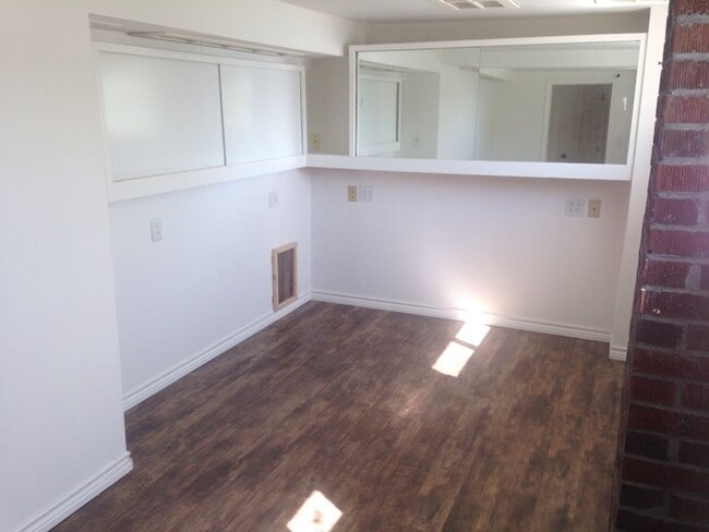 Bedroom with water view. - 9876 SE Southworth Dr Unit Basement Apartment