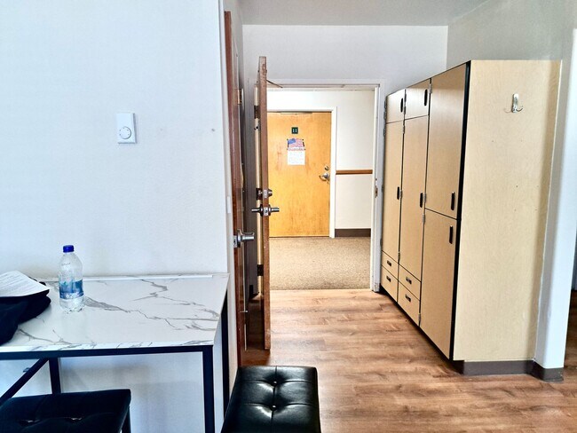 Photo - UNDER NEW MANAGEMENT: Accessible Studio w/ Laminate Floors! All-Inclusive "One Bill" Living, Free... Unit 3959 Sheridan Ave Apt 10