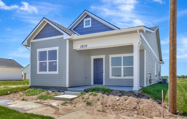 Photo - Modern 3-Bed Ranch in Maize – Zero-Entry L...