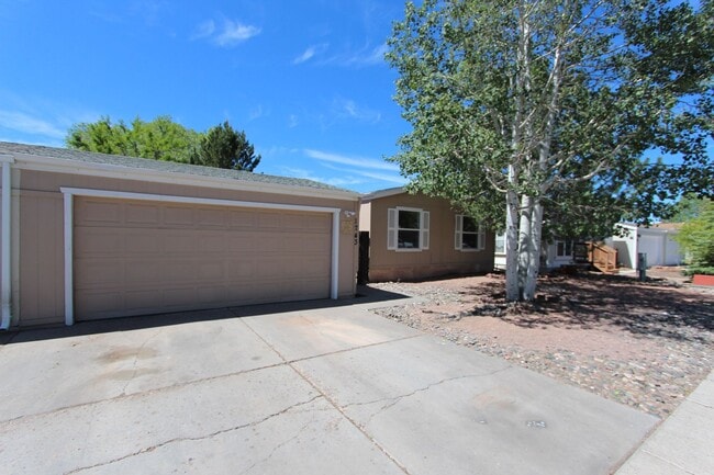 Building Photo - Bright 3-Bedroom Home with Fenced Yard + Detached 2-Car Garage