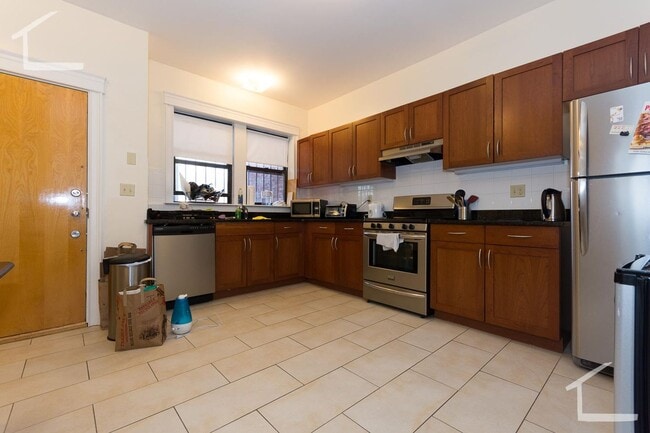 Photo - 6/1 No Fee! Large, renovated 4BR/2BA with heat inc, balcony