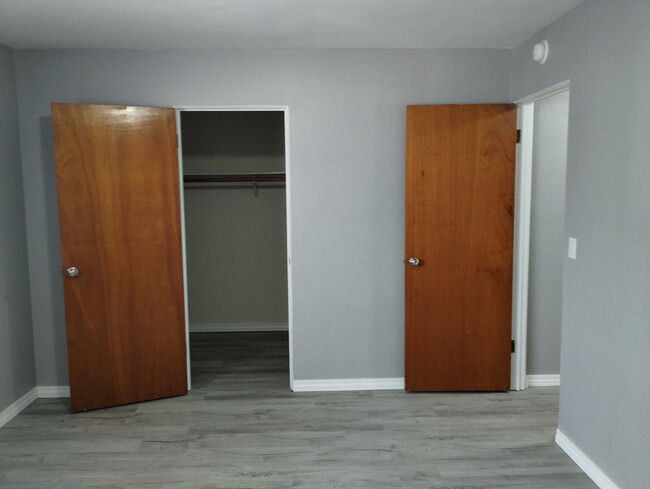 Entrance to bedroom & closet door - 218 Castellano Dr Townhome