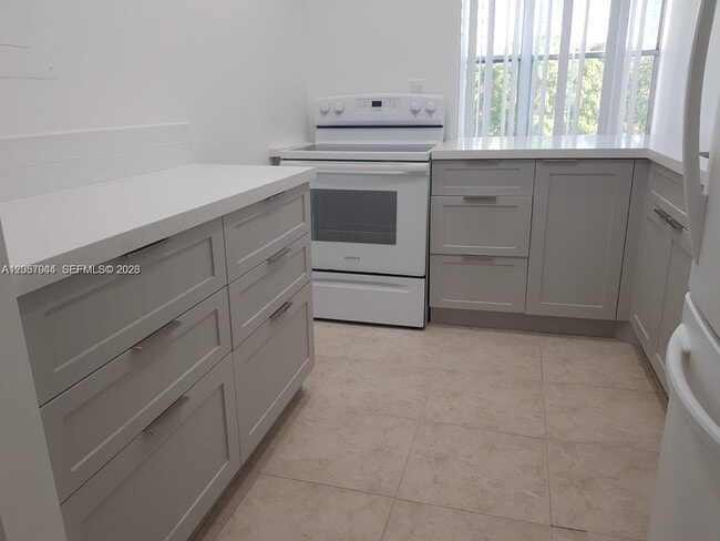 Building Photo - 200 177th Dr Unit 308