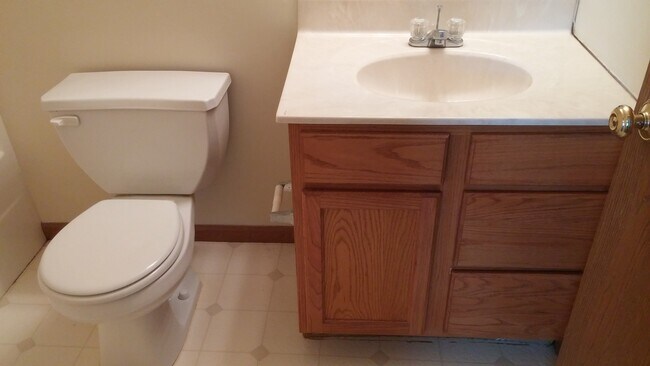 Photo - Spacious 2BD 2 BA duplex with 2 Car attached garage. Just a few steps away from everything you need!