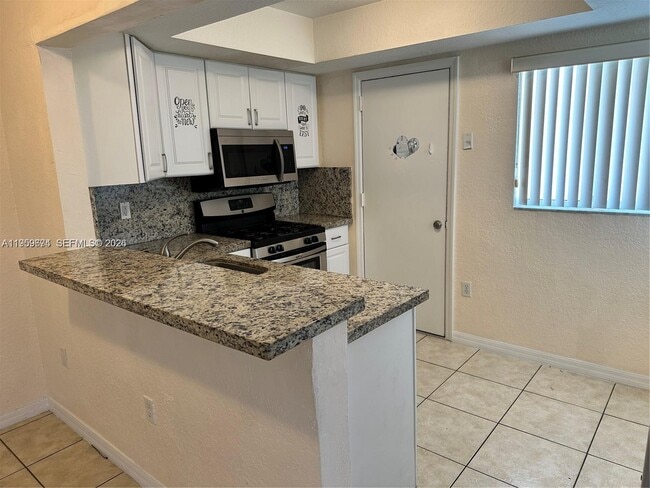 Photo - 7713 SW 88th St Unit A310