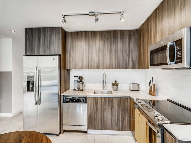 Fully-Equipped Kitchens with Stainless Steel Appliances