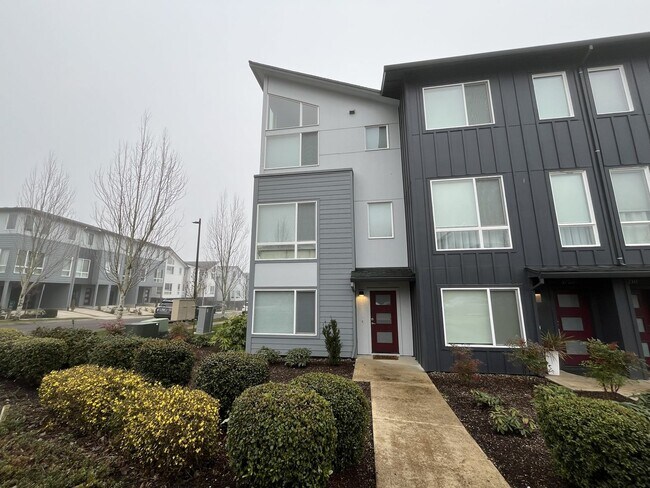 Photo - Three-Level Townhome with Island Kitchen, Bonus Room, Balcony & Attached Garage