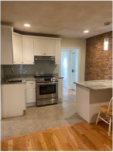 Building Photo - 800 E 3rd St Unit 2