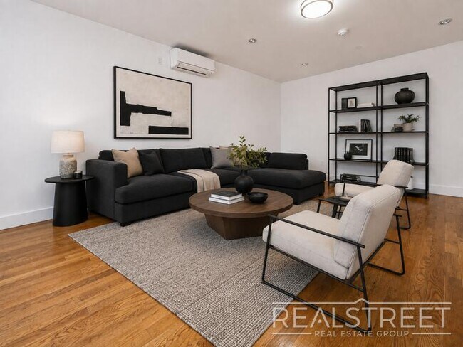 Photo - Stunning 2-Bedroom Apartment at Lofts@QB | Modern Kitchen & Sun-Filled Living Space Unidad 318