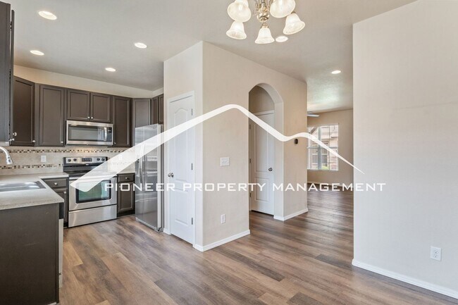 Photo - Low-Maintenance Living with Mountain Views! 3BR Townhome, 2-Car Garage & A/C