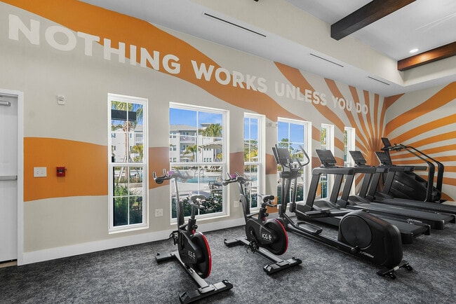 Elevate your fitness journey in this vibrant apartment gym, designed for motivation and energy.