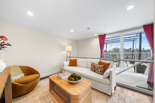 Photo - Stylish 2BR/2BA Bi-Level Condo with Private Roof Deck and Covered Parking!